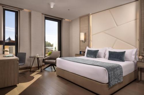 Habitación Doble Superior con terraza del hotel Vp Plaza España Design. Foto 5