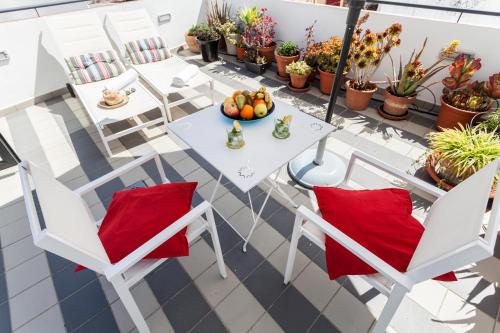 Apartamento Ático con terraza privada del hotel Sevilla Home Center. Foto 2