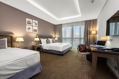 Habitación Triple del hotel Royal Prague. Foto 3
