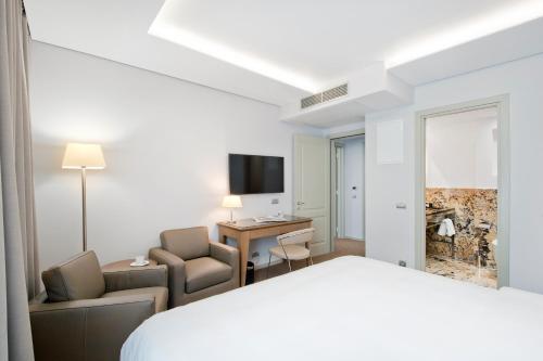 Suite Familiar con 2 baños del hotel Royal Prague. Foto 1