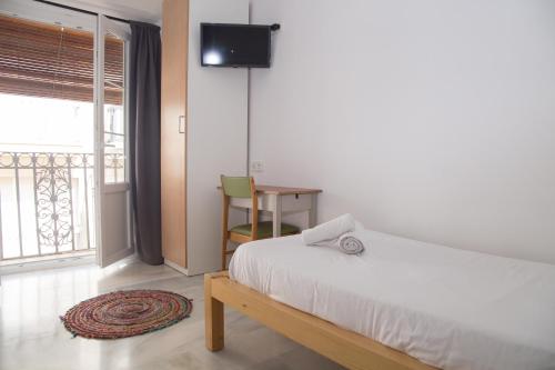 Habitación Individual Deluxe con balcón del hotel The Nomad