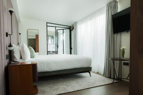 Habitación Doble Deluxe del hotel Maison Breguet. Foto 2