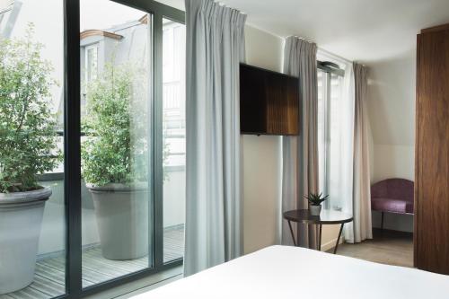Habitación Doble Deluxe del hotel Maison Breguet. Foto 3