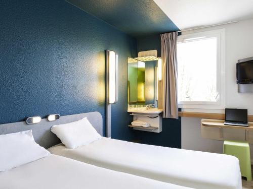 Habitación Doble - 2 camas del hotel ibis budget Paris Porte de Vincennes. Foto 3