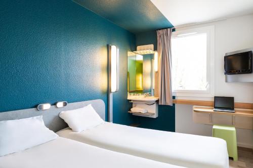 Habitación Doble - 2 camas del hotel ibis budget Paris Porte de Vincennes. Foto 7