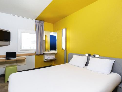 Habitación Doble Estándar del hotel ibis budget Paris Porte de Vincennes. Foto 1