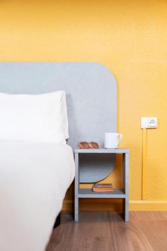 Habitación con cama extragrande - Adaptada para personas de movilidad reducida del hotel ibis budget Paris Porte de Vincennes. Foto 12