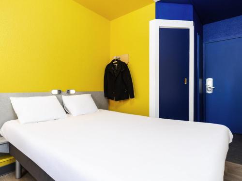 Habitación Doble Estándar del hotel ibis budget Paris Porte de Vincennes. Foto 10