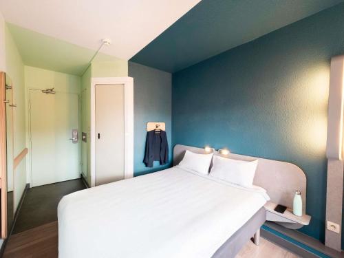 Habitación Doble Estándar del hotel ibis budget Paris Porte de Vincennes. Foto 4