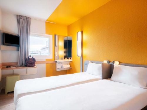Habitación Doble - 2 camas del hotel ibis budget Paris Porte de Vincennes. Foto 6