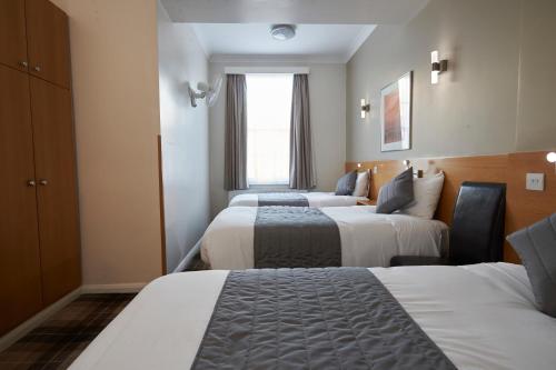 Habitación Triple del hotel Luna Simone. Foto 5