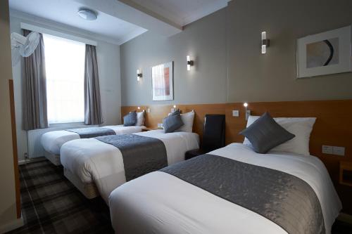 Habitación Triple del hotel Luna Simone. Foto 6