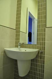 Cama en habitación compartida femenina de 6 camas con baño compartido del hotel Polaroid Siesta