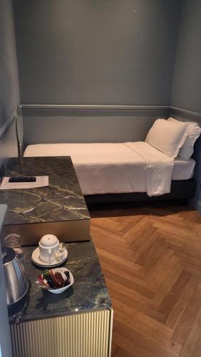 Habitación Triple Deluxe del hotel Berna. Foto 5