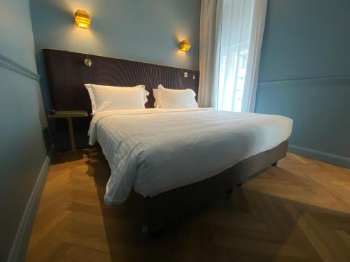 Habitación Triple Deluxe del hotel Berna. Foto 11