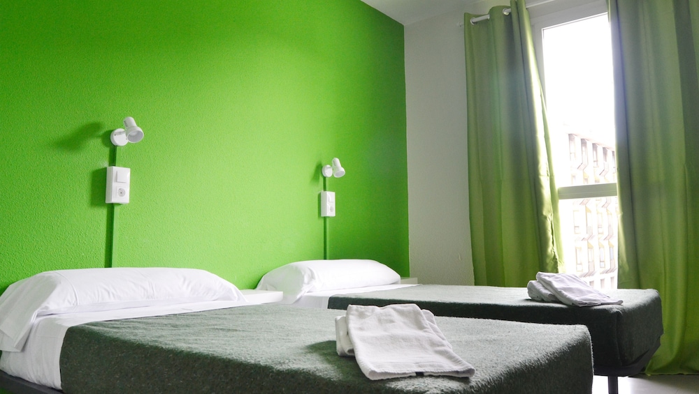 Habitación con 2 camas individuales del hotel Motion Chueca. Foto 1
