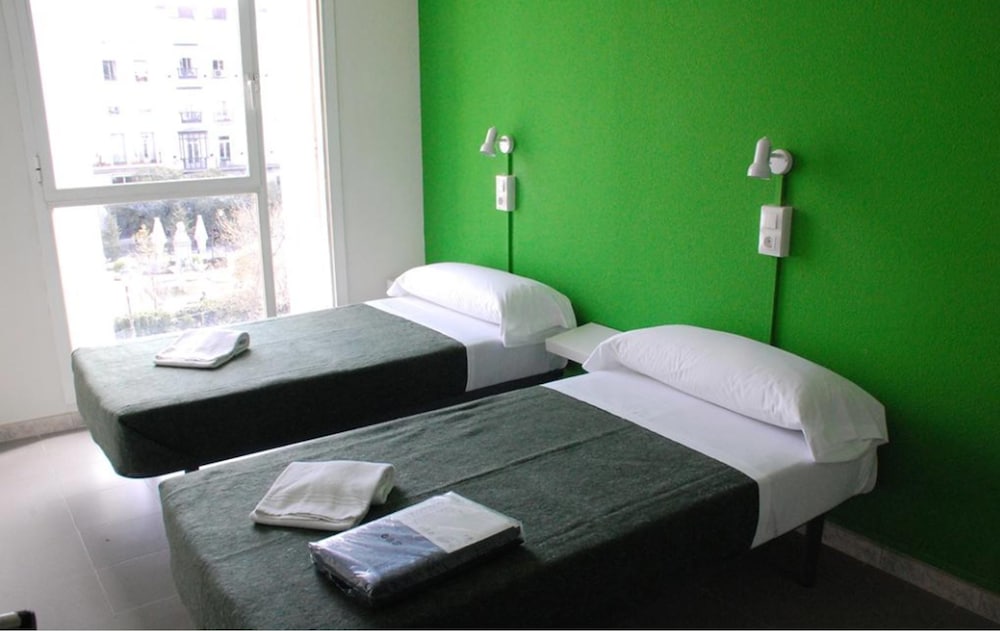 Habitación con 2 camas individuales del hotel Motion Chueca. Foto 3