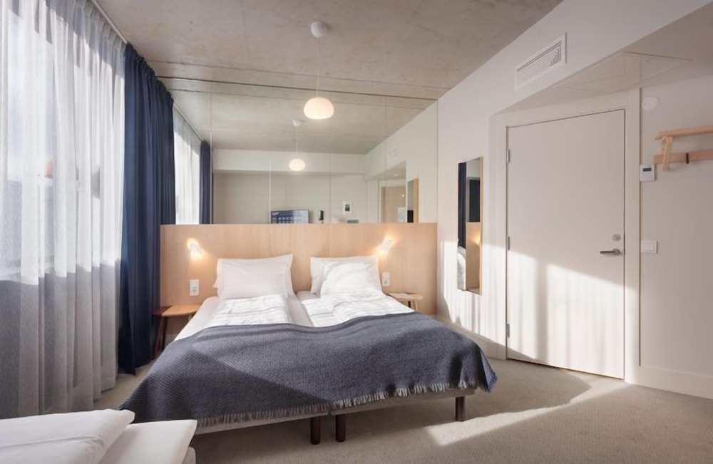 Habitación Triple Estándar del hotel Zander K. Foto 2
