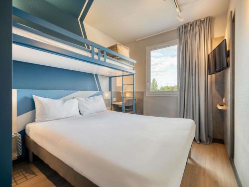 Habitación Doble Estándar del hotel ibis budget Orly Chevilly Tram 7. Foto 7