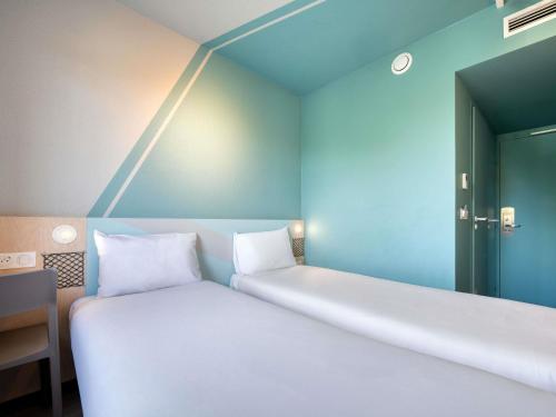 Habitación Doble Estándar - 2 camas del hotel ibis budget Orly Chevilly Tram 7. Foto 6