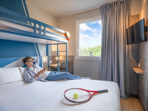 Habitación Doble con litera del hotel ibis budget Orly Chevilly Tram 7. Foto 9