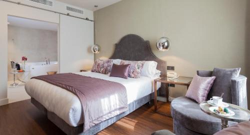 Habitación Doble Deluxe con jacuzzi® del hotel Palacete De Alamos. Foto 1