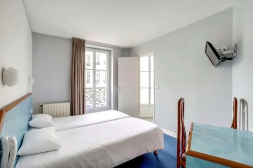 Habitación Twin (2 camas individuales) del hotel Royal Mansart. Foto 2
