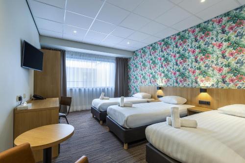 Habitación Triple Confort del hotel Best Western Amsterdam. Foto 1