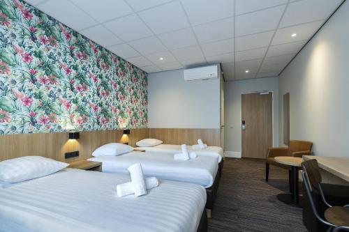 Habitación Triple Confort del hotel Best Western Amsterdam. Foto 2