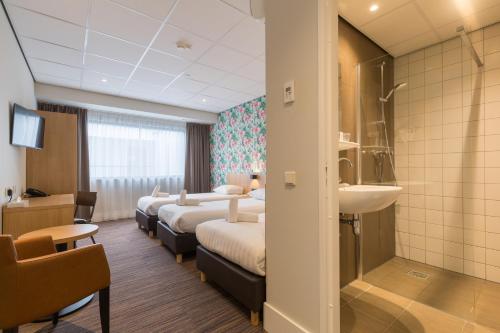 Habitación Triple Confort del hotel Best Western Amsterdam. Foto 7