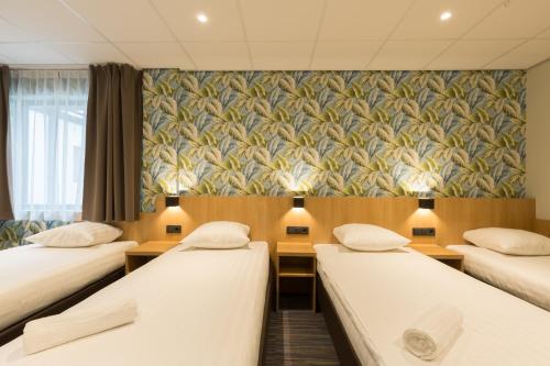 Habitación Cuádruple Confort del hotel Best Western Amsterdam. Foto 4