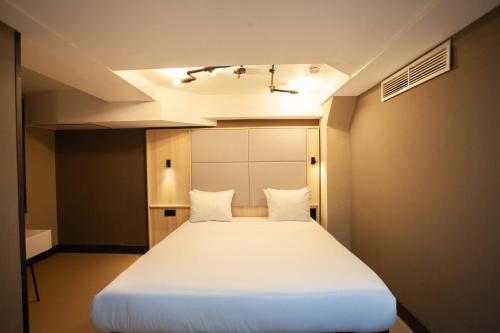Habitación Triple Souterrain del hotel The Alfred. Foto 10