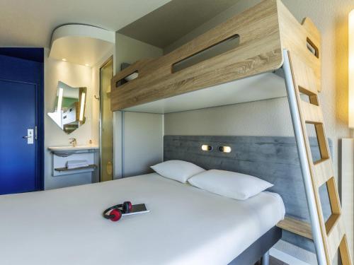Habitación Triple con litera del hotel Ibis Budget Paris Porte D' Italie Ouest. Foto 4