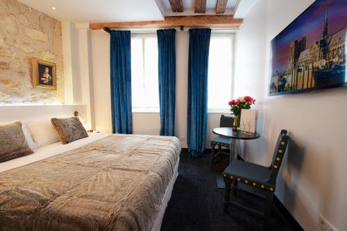 Habitación Doble del hotel Le Clos Notre Dame. Foto 1