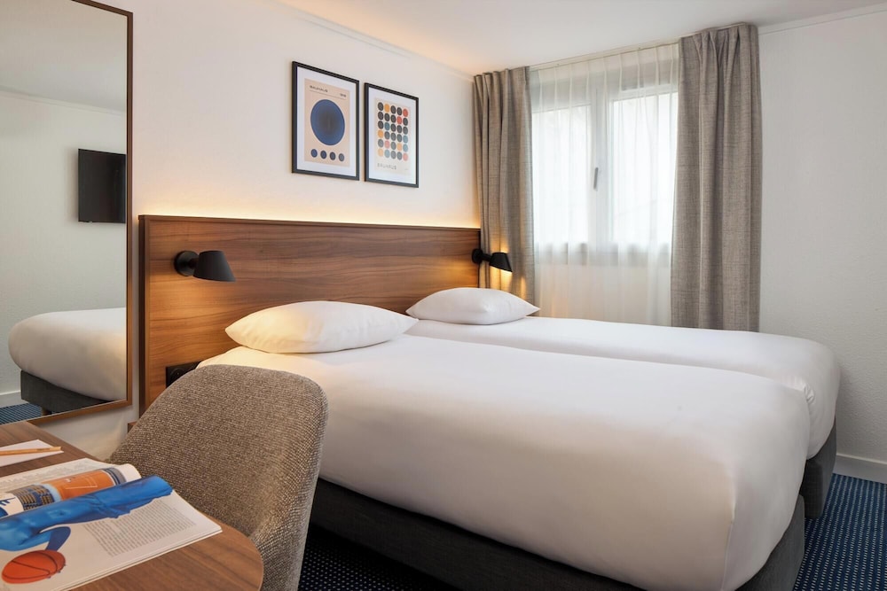 Habitación Confort con 2 camas individuales del hotel Timhotel Nation. Foto 1