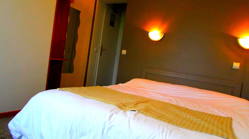 Habitación con 2 camas individuales del hotel Choisy
