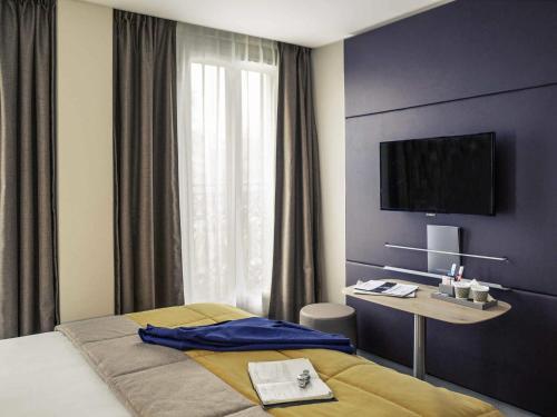 Habitación Doble Clásica del hotel Mercure Paris 9 Pigalle Sacre-coeur. Foto 6