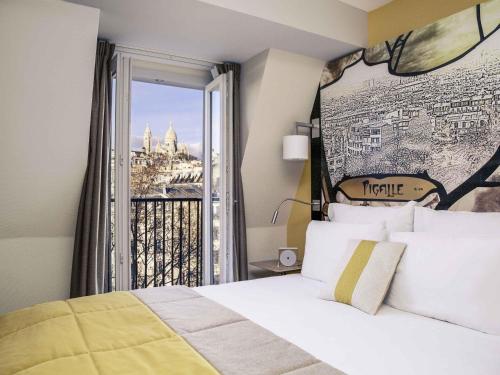 Habitación Privilege con balcón del hotel Mercure Paris 9 Pigalle Sacre-coeur. Foto 4