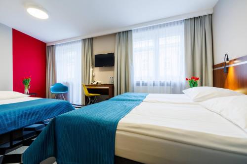 Habitación Triple Clásica del hotel Wyspianski. Foto 10