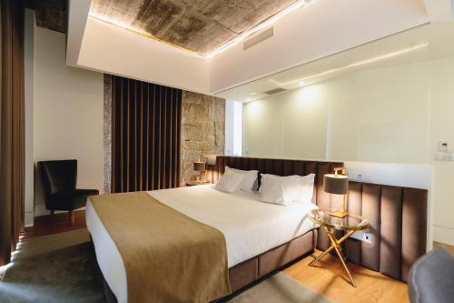 Habitación Triple Deluxe del hotel Borralha, Restaurante and Spa