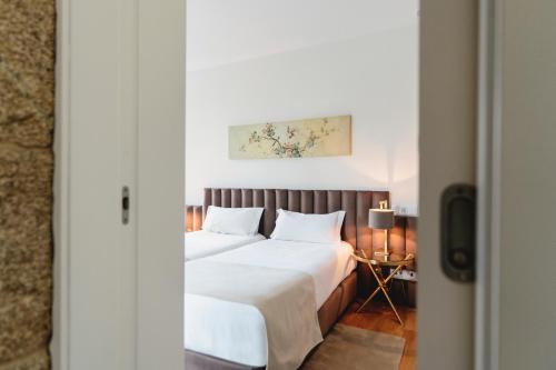 Habitación Triple Deluxe del hotel Borralha, Restaurante and Spa. Foto 5