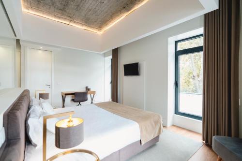 Habitación Triple Deluxe del hotel Borralha, Restaurante and Spa. Foto 6