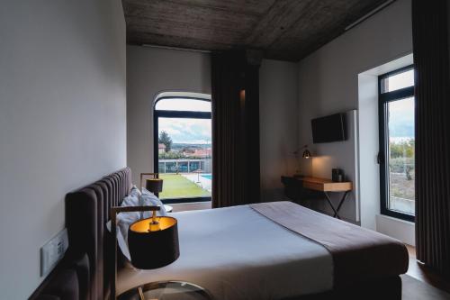 Habitación Doble Deluxe con ducha del hotel Borralha, Restaurante and Spa. Foto 4