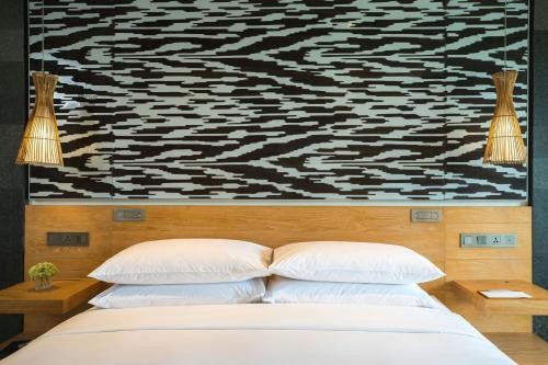 Deluxe Terrace Ocean Twin, Guest room, 2 Twin/Single Bed(s) del hotel Renaissance Bali Uluwatu Resort and Spa. Foto 2