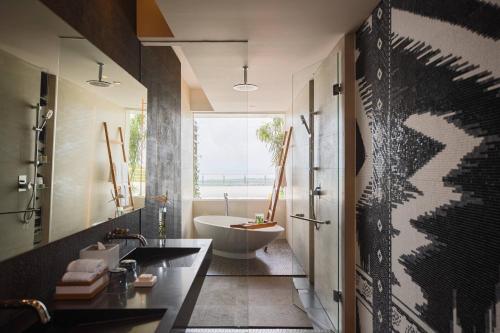 Deluxe Terrace Ocean Twin, Guest room, 2 Twin/Single Bed(s) del hotel Renaissance Bali Uluwatu Resort and Spa. Foto 6