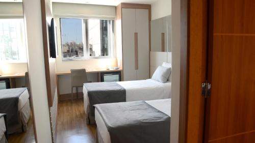 Habitación Doble Deluxe - 2 camas del hotel Atlântico Travel. Foto 3