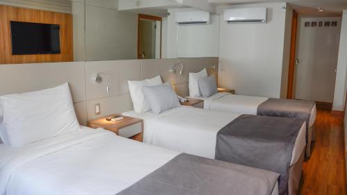 Habitación Triple Estándar del hotel Atlântico Travel. Foto 2