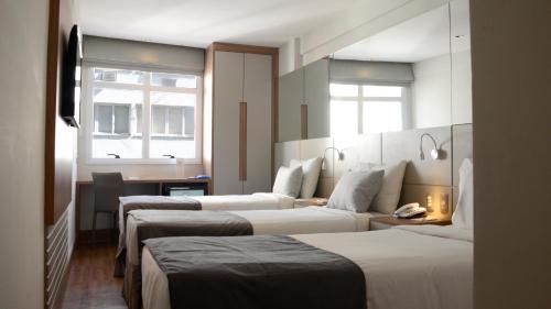Habitación Triple Estándar del hotel Atlântico Travel. Foto 10