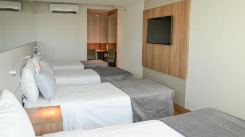 Habitación Cuádruple Deluxe del hotel Atlântico Travel. Foto 6