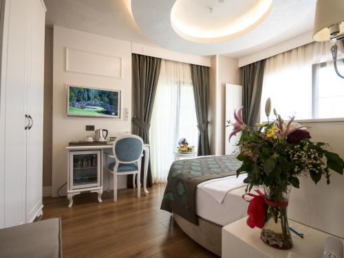 Habitación Deluxe Esquinera del hotel Antusa Palace and Spa